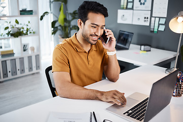 Image showing Phone call, smile and strategy with a business man chatting while working at his desk in the office. Mobile, contact and communication with a young male employee chatting or networking for planning