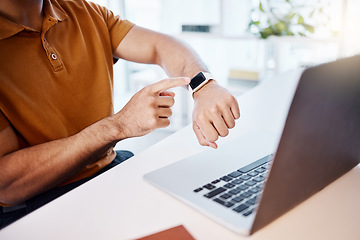 Image showing Man, hands and watch by laptop for time, schedule or monitoring heart rate at the office desk. Hand of male looking at wristwatch while working on computer for business deadline, performance or timer