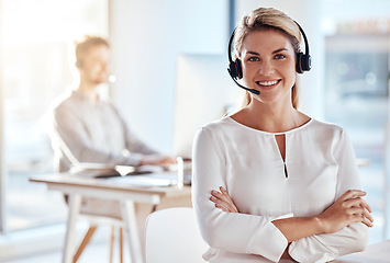 Image showing Portrait, customer support and smile with a woman consultant working in her office for after sales service. Call center, contact us and crm with a young female employee consulting using a headset