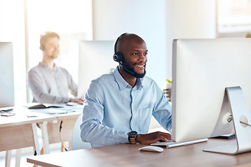 Image showing Call center, computer and online with black man in office for customer service, technical support and advice. Technology, contact us and communication with employee operator in help desk agency