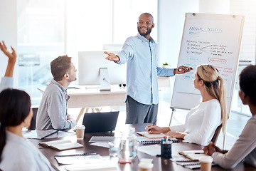 Image showing Presentation, question and whiteboard with a business man in the office and talking to team about our vision. Meeting, teaching and information with an african american male speaker giving a workshop