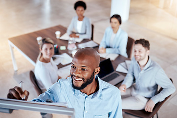 Image showing Business black man, writing and board for presentation for business growth, development and seminar. Businessman, african ceo and idea for company goals at conference with employee group in top view