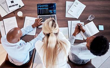 Image showing Investment, collaboration and laptop with business people in office for stock market, trading or data. Growth, chart and finance with top view of employee and review for economy, documents or digital