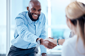 Image showing Business people, smile and handshake for partnership, deal or collaboration. Welcome, happy and black man and woman shaking hands for agreement, b2b or congratulations, opportunity and onboarding.