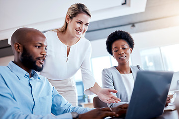 Image showing Laptop, helping and business people training with mentor, teaching or learning. Computer, happy and mentor or coaching group leader explaining to employees, interns or workers with project in office.