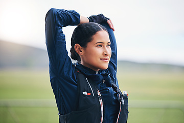 Image showing Woman, stretching arms and thinking for fitness, journey and outdoor exercise in nature for health. Young girl, ready and start training in morning with focus, adventure and workout in countryside