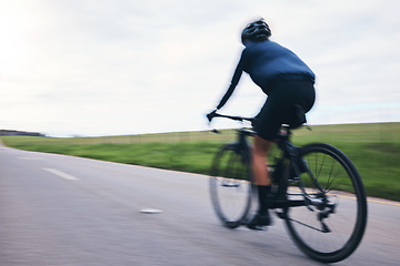 Image showing Person, bicycle and cycling on motion blur, sky mockup and countryside road for triathlon from behind. Cyclist, bike and speed for sports training, cardio performance and power for competition race