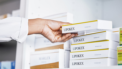 Image showing Doctor, hands and drugs from shelf for healthcare illness, pain or relief of medication at pharmacy. Hand of medical professional holding pharmaceutical products for inventory or packing at clinic