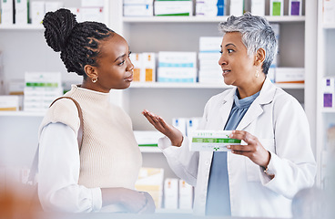 Image showing Doctor, consulting and patient for healthcare prescription, medication or diagnosis for cure, illness or pain at pharmacy. Woman medical pharmacist talking to customer about pills or drugs at clinic