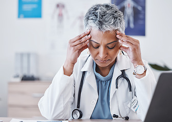 Image showing Senior woman, doctor and headache in burnout, stress or anxiety for healthcare at the hospital. Tired elderly female medical professional suffering from bad head pain, migraine or ache at the clinic