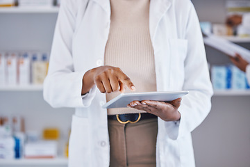 Image showing Doctor, woman and hands on tablet for medical research, Telehealth or inventory at pharmacy. Hand of female healthcare professional in data analysis or health insurance holding technology at clinic