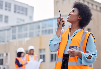 Image showing Construction worker, black woman with walkie talkie and inspection of work site, engineering and architecture. Communication, technology and female contractor, building industry and labor outdoor
