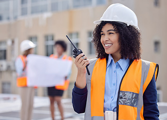 Image showing Construction, woman with walkie talkie and communication, engineering and architect at work site. Inspection, technology and happy female contractor with radio, building industry and labor outdoor