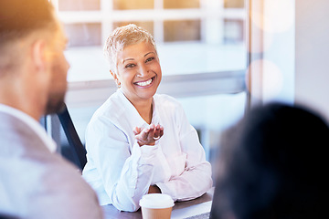 Image showing Senior business woman, meeting and smile in discussion, seminar and happy for team building in office. Female manager, leader and talking to staff with happiness for workshop, planning or strategy