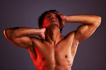 Image showing Light, relax and man profile in a studio with art lighting and creative thinking with muscles. Art, isolated and gray background of an attractive male model with artistic, sensual and posing