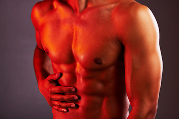 Image showing Fitness, neon and abdomen of man in studio for healthy body, muscles and self care on purple background. Creative aesthetic, glow and stomach of strong male model for exercise, wellness and skincare