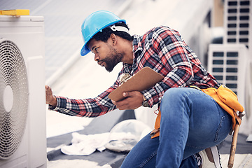 Image showing Technician, clipboard or air conditioning inspection on rooftop for safety, power or maintenance. Electrician, black man or paperwork on hvac system, ac repair or quality assurance for sustainability