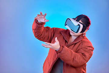 Image showing Vr gaming or girl in metaverse studio for future innovation, gaming or 3d on blue background. Futuristic media mockup, technology software or woman gamer with digital virtual reality glasses online