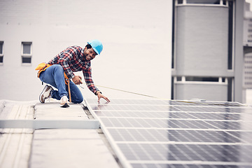 Image showing Happy portrait man, solar panel and tape measure for photovoltaic grid, electricity sustainability or renewable energy. Rooftop quality inspection, African male handyman and power supply maintenance