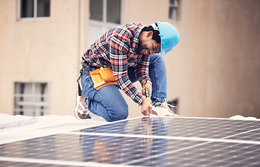 Image showing Solar panel install, engineer and black man on roof, sustainable or renewable energy mockup. Photovoltaic technician, electricity and happy person check, maintenance or inspection with screwdriver.