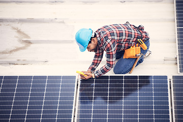 Image showing Black man, solar panel inspection and engineering sustainability and eco friendly with renewable energy. Maintenance check, male engineer and infrastructure with sustainable electricity and top view