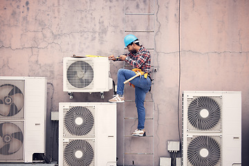 Image showing Black man, ac repair and technician, maintenance with engineering and fixing air conditioner with tools. Handyman, service and manual labor with male electrician, technology and helmet for safety