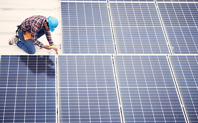 Image showing Black man, solar panel installation and renewable energy, sustainability and eco friendly technology. Maintenance, male engineer and infrastructure, electricity and top view with energy saving