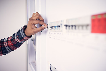 Image showing Man, hand and electrician with electricity fuse box, check power supply with maintenance on main circuit breaker switch. Engineer, technician and male worker with handyman and electrical fix