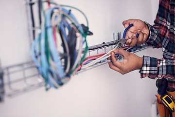 Image showing Electrician, technician and hands of man with cable maintenance, inspection and home repair. Construction worker, electricity and male engineer, handyman and contractor with circuit, wires and tools