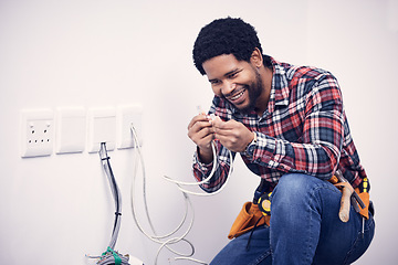 Image showing Electric, industry and electrician working on a switchboard with cables for current, fuse or voltage. Electricity, power and African male industrial worker doing maintenance, repairs or fixing plugs.