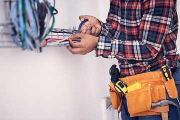 Image showing Electrician, technician and man with tool for cable maintenance, inspection and home repair. Construction worker, electricity and male engineer, handyman and contractor with circuit, wires and belt