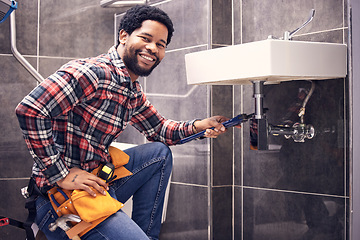 Image showing Portrait, man and plumber with smile, maintenance and installation with home repairs. Face, Nigerian male employee or worker with tools, fixing pipes and sink with handyman, contractor and renovation