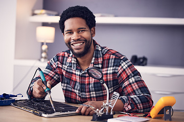 Image showing Black man, technician fixing electronics and tablet hardware, soldering iron tools and tech repair. Maintenance, magnifying glass and electrical fix with happy male in portrait working on device