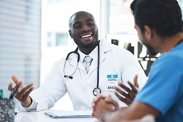 Image showing Black man, doctor and nurse communication in a hospital with medical consultation. Healthcare, meeting and working wellness employee with smile in clinic talking about insurance and happy consulting