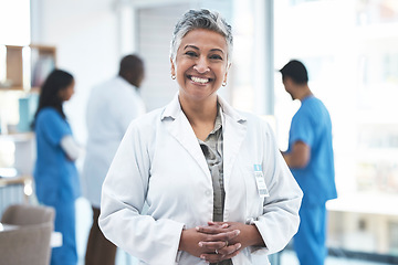 Image showing Senior doctor, woman and smile in clinic portrait for inspection, excited and vision for expert. Female medic, leadership and management with confidence, success and happy for career goal at hospital