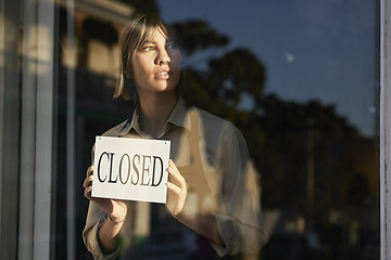 Image showing Business owner, inflation and woman with closed sign, announcement and financial crisis. Female employee, entrepreneur and worker with issues, economy and problems with shop closing and startup