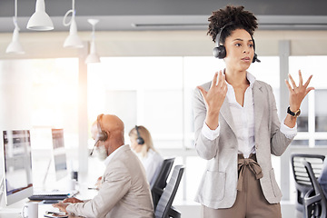 Image showing Business woman, call center and consulting on headphones for customer service, telemarketing or support at office. Female consultant agent talking on headset for online advice or sales in contact us