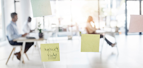 Image showing Sticky note, blurred background and business people sitting in an office for budget planning or strategy. Memo, glass and flare with a professional employee group at work in a corporate workplace