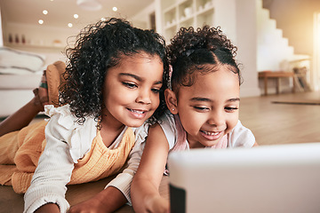 Image showing Tablet, friends and girls on the floor, playing and happiness for bonding, break and relaxing at home on break. Female children, happy kids and online games in living room, smile and watching a movie