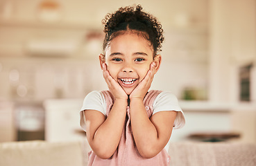 Image showing Girl child, surprise smile and portrait in home living with happiness, youth and childhood. Happy female kid, excited and hands on face with wow in lounge, house or apartment with blurred background