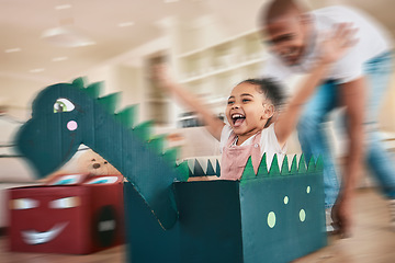 Image showing Dragon, cardboard and father playing child in fantasy game bonding in a living room or home lounge together. Blur, happy and single parent or dad having fun with kid or daughter excited to play