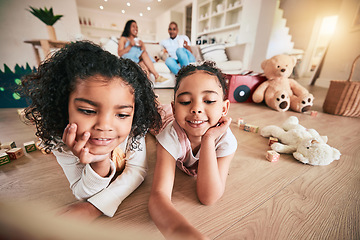 Image showing Kids, sister and best friends on the living room floor together in their home for bonding while having fun. Children, family and smile with happy girls in their house for growth or development