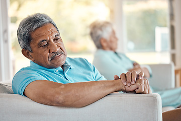 Image showing Angry, senior couple and fighting on a sofa about divorce, breakup and separation in their home. Argue, depression and toxic elderly man with woman on couch after conflict, crisis or marriage problem