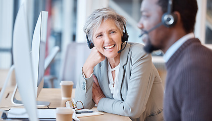 Image showing Call center, team talking and laughing woman in office with coworker, funny joke or comedy. Telemarketing, contact us and happy elderly person, friends and black man laugh at customer service humour