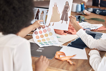 Image showing Fashion, designer sketch and team collaboration on project, illustration or paper at a desk in office. Creative women, hands and teamwork on planning, discussion and drawing a design for clothes idea