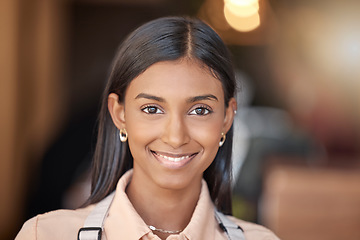 Image showing Happy, smile and portrait of an Indian employee at work for corporate happiness and business. Young girl, headshot and a worker smiling with confidence in professional career, work and management