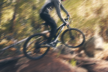 Image showing Cycling, sport motion blur and man on a bicycle in a dirt forest road doing training and exercise. Biker, outdoor trail and athlete with cardio and energy on adventure for fitness on path