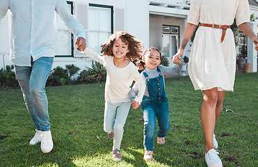 Image showing Family, holding hands and kids running with their parents outdoor in the garden of their home together. Children, fun and daughter siblings playing with their mother and father outside in the yard