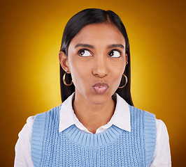 Image showing Thinking, idea and woman in studio unsure, pensive and wondering on gradient yellow background. Contemplating, doubt and puzzled Indian lady with decision, choice or emoji while posing isolated