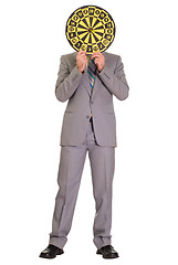 Image showing Businessman Hiding Behind Dartboard